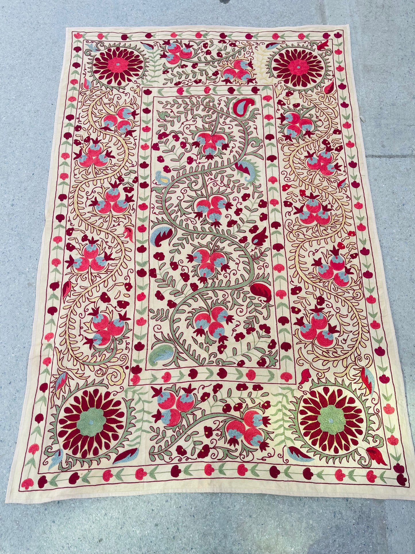 Handmade Silk Suzani Embroidery

Beautiful traditional embroidery made by hand with silk threads.
Elegant design, perfect for decorating a table, wall, or home interior.

Size: 6.6 ft × 4.4 ft
A unique and authentic piece of handmade art